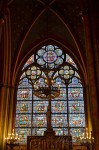 A stained glass window of Notre-Dame, south side chapel.