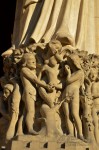 The story of the Eden Garden. The temptation of Adam & Eve by the devil. Pedestal of the statue of Madonna with Child, western portal (of the Virgin), of Notre-Dame de Paris, France